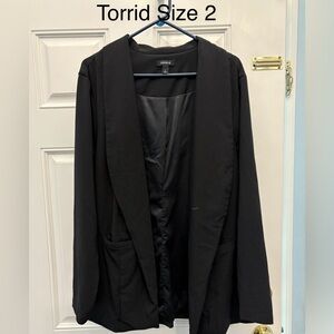 Black Blazer or Suit Jacket with 2 front pockets.